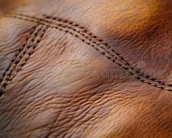 Luxury leather craftsmanship detail - 1-of-1 exclusive fashion boutique.