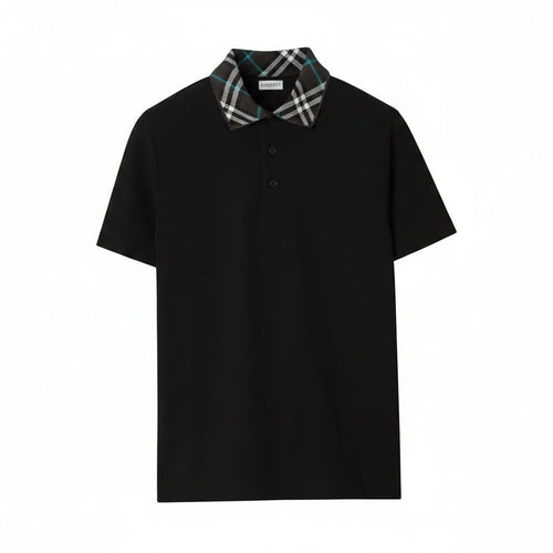 Close-up of the Burberry check pattern on a black pique polo shirt collar.