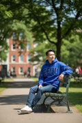 Front view of the royal blue Geedup Team Logo hoodie with black embroidery.