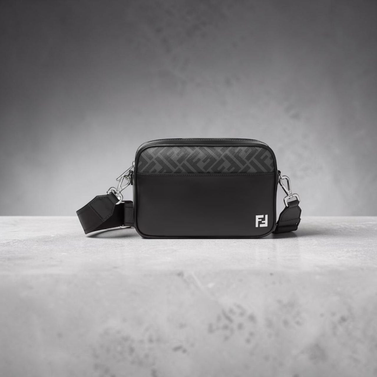 Model wearing Fendi black leather camera bag with FF motif panel.