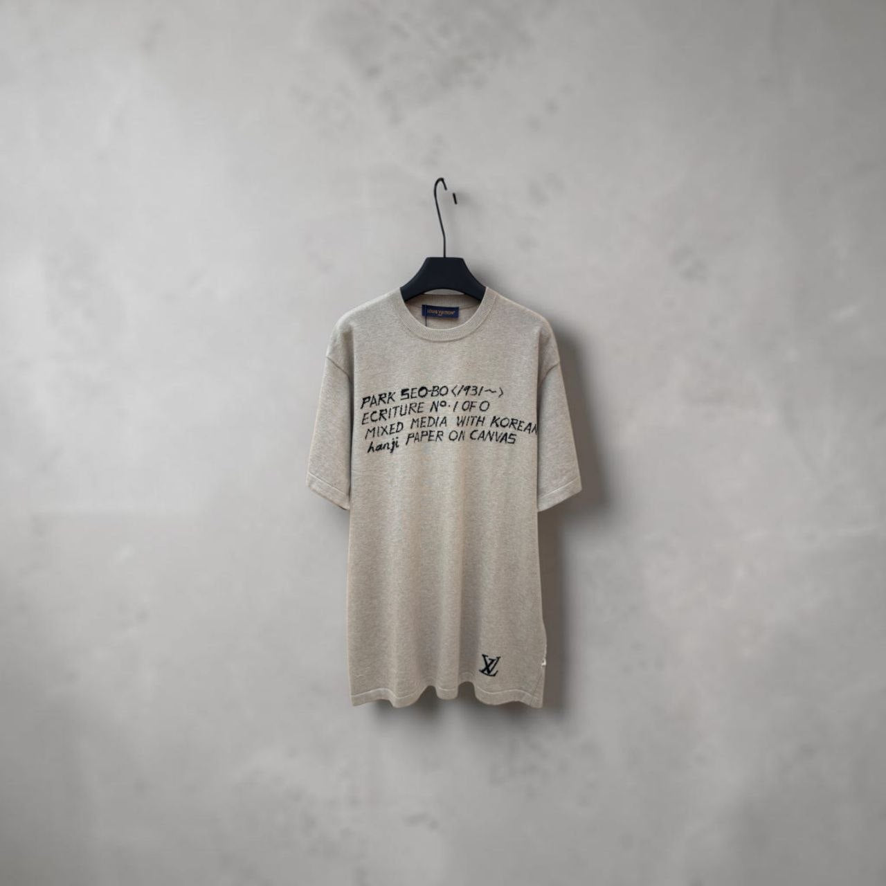 Louis Vuitton x Park Seo-Bo beige t-shirt with black museum text graphic.