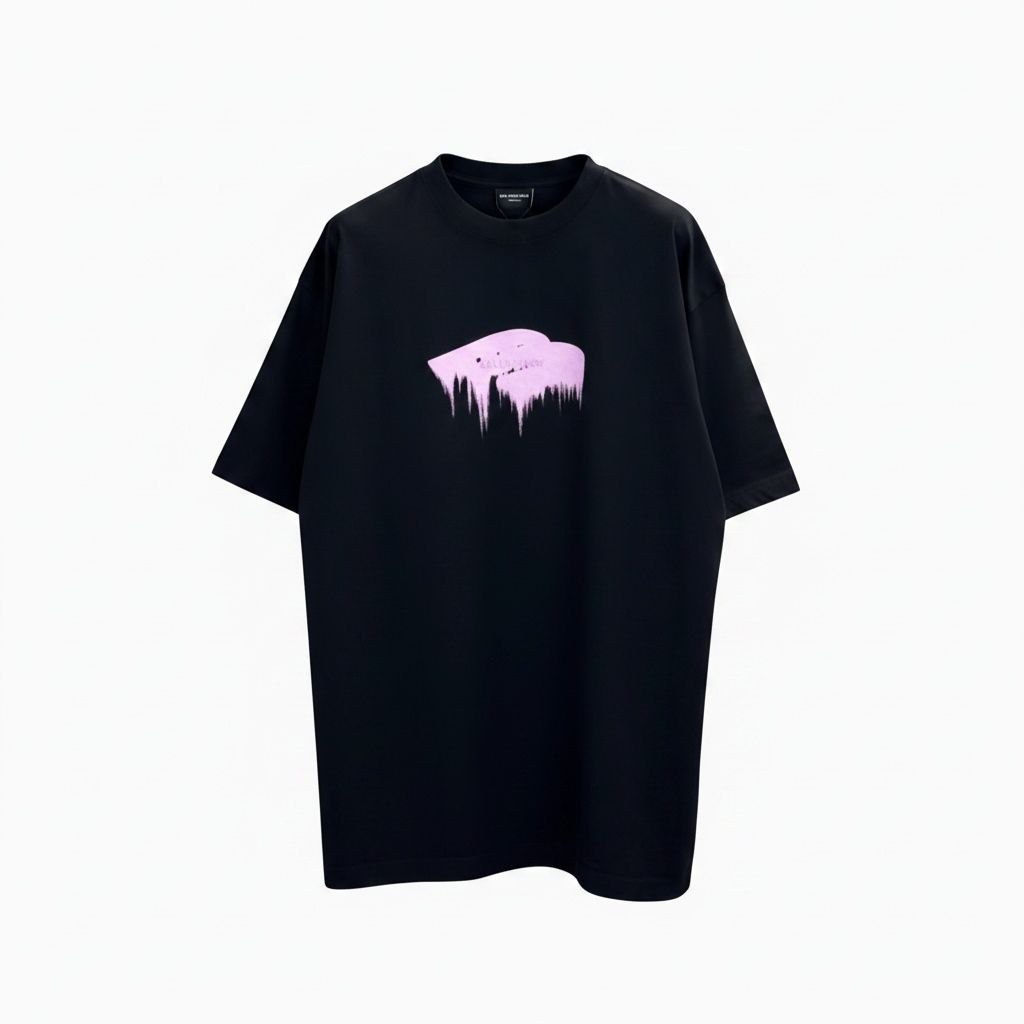 Model wearing an oversized black Balenciaga t-shirt with a glossy pink wet brush logo.