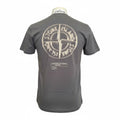 Back view of a charcoal Stone Island t-shirt with a large white compass logo and engineering text.